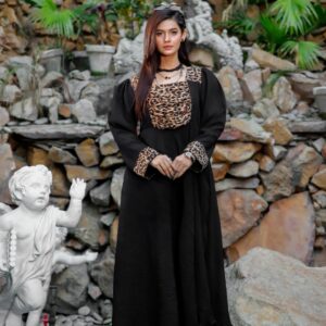 egantly draped in timeless black,